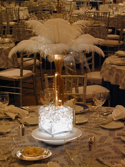 Short Music theme centerpiece Extended Lit trumpet with ostrich feather